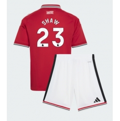 Fotbollsset Barn Manchester United Luke Shaw #23 Hemmatröja 2026-27 Mini-Kit Kortärmad (+ korta byxor)