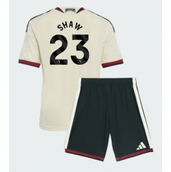 Fotbollsset Barn Manchester United Luke Shaw #23 Tredje Tröja 2026-27 Mini-Kit Kortärmad (+ korta byxor)